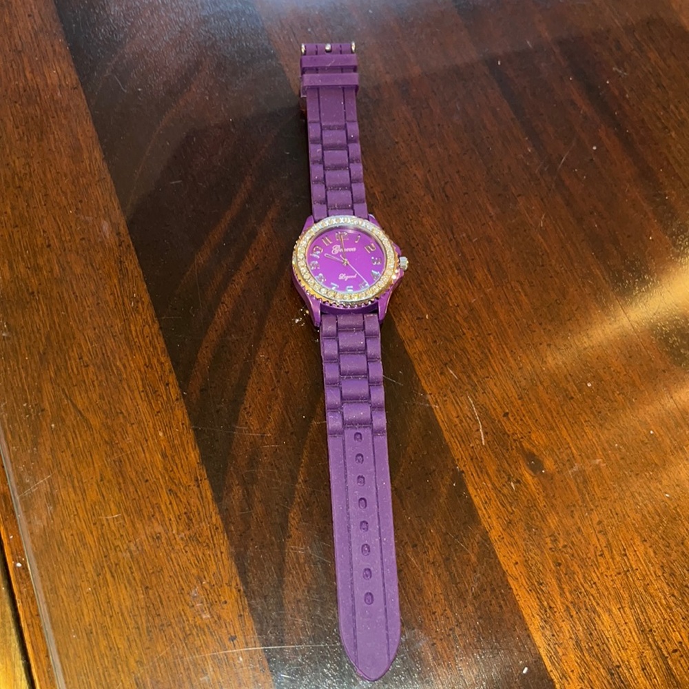 NWOT purple rubber wristband watch